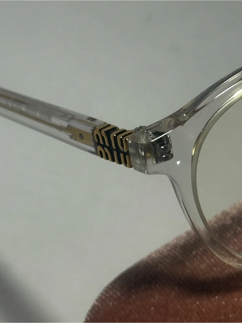 Miu Miu Clear Round Eyeglasses with Pink Velvet Case